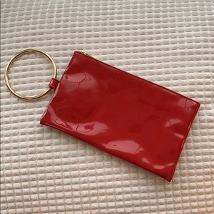 Quo red wristlet